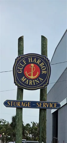 a view of a house with a patio and entertaining space