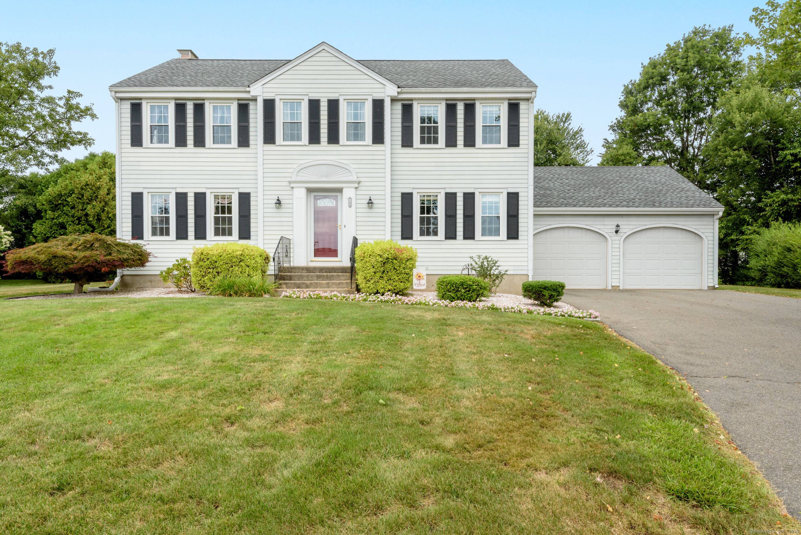 15 Grass Bonnet Lane Wethersfield, CT 06109 - Photo 1 of 1 a front view of a house with garden