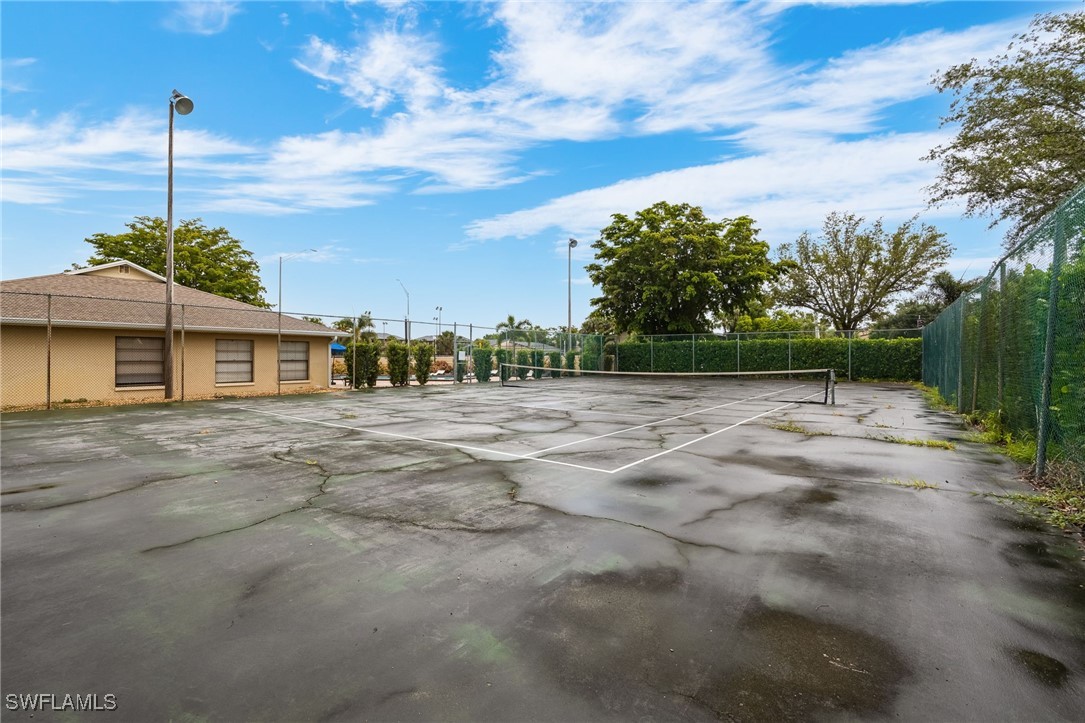 5315 Summerlin Road, Unit 1514 Fort Myers, FL 33919 - Photo 17 of 17 a view of a house with a backyard