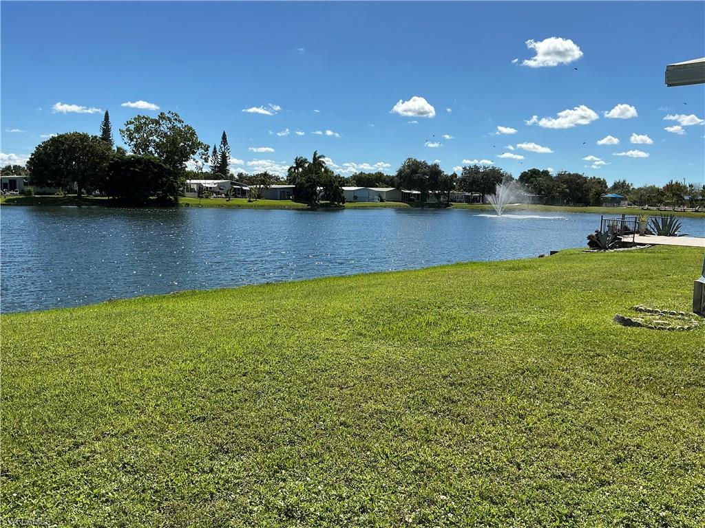 237 Eagle Road, Unit 237 Naples, FL 34114 - Photo 1 of 27 a view of a lake