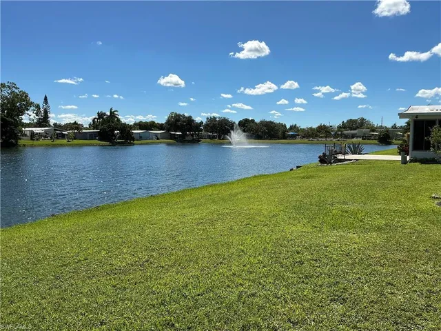 a view of a lake from a yard