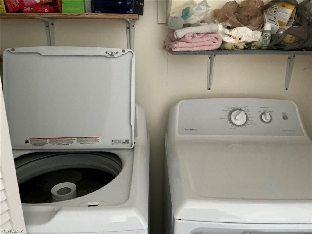 237 Eagle Road, Unit 237 Naples, FL 34114 - Photo 24 of 27 a utility room with dryer and washer
