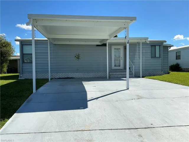a view of a back yard of the house