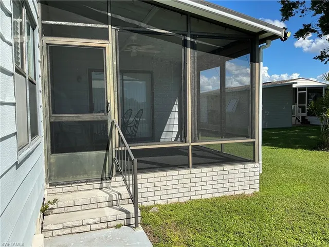 a kitchen with sink and cabinets