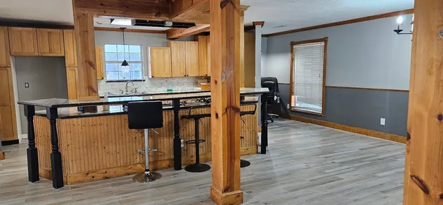 a view of a kitchen from the hallway