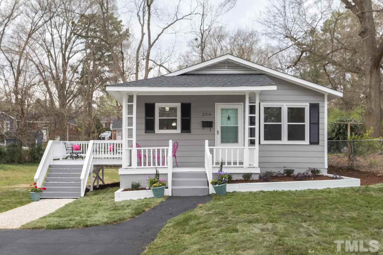 2314 Glascock Street Raleigh, NC 27610 - Photo 1 of 25 a front view of a house with a yard