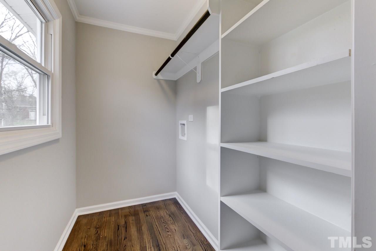 2314 Glascock Street Raleigh, NC 27610 - Photo 20 of 25 a view of small space with racks on the wall