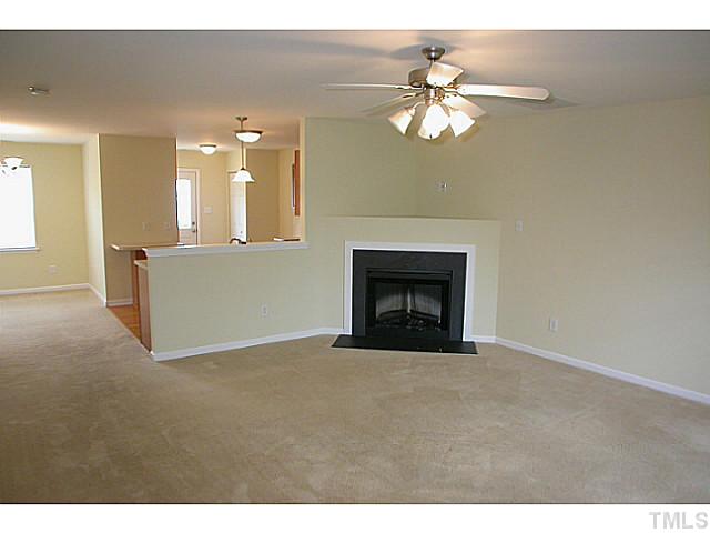 5131 Thornton Knoll Way Raleigh, NC 27616 - Photo 4 of 18 Spacious living room is open to the Kitchen as well as the dining room.