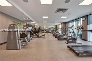 951 Brickell Avenue, Unit 3002 Miami, FL 33131 - Photo 17 of 25 a view of a room with gym equipment