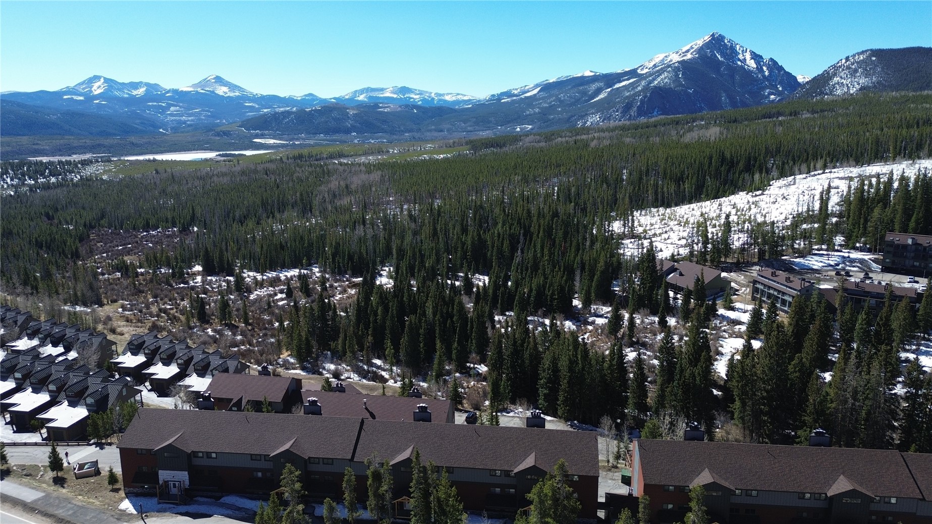 9800 Ryan Gulch Road, Unit 108 Silverthorne, CO 80498 - Photo 19 of 33 a view of a lake with a mountain