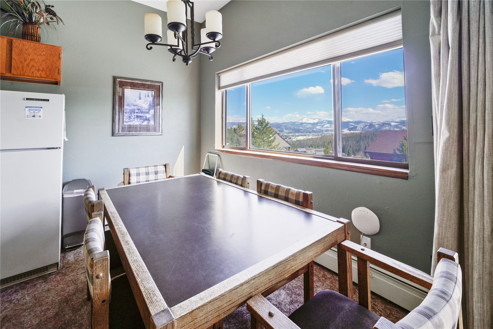 9800 Ryan Gulch Road, Unit 108 Silverthorne, CO 80498 - Photo 8 of 33 a view of a livingroom with furniture and window