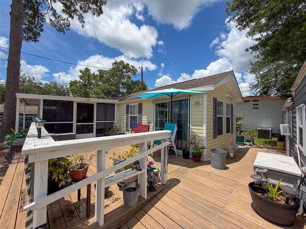 2092 Culbreath Road, Unit A42 Brooksville, FL 34602 - Photo 11 of 70 a front view of house with yard outdoor seating and barbeque oven