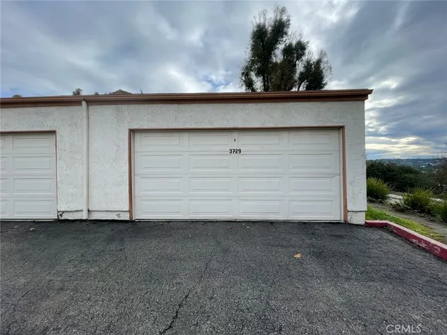 a view of a house with a garage