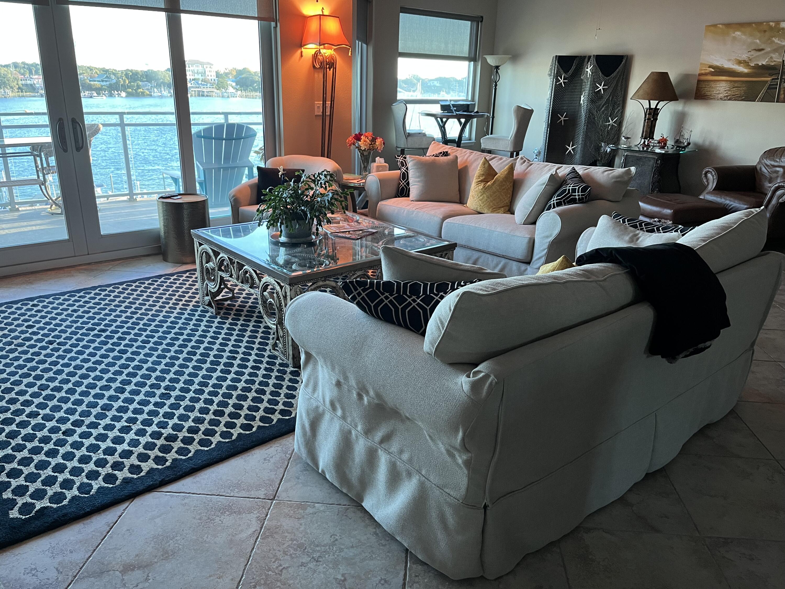 211 Durango Road, Unit 414 Destin, FL 32541 - Photo 13 of 50 a living room with furniture