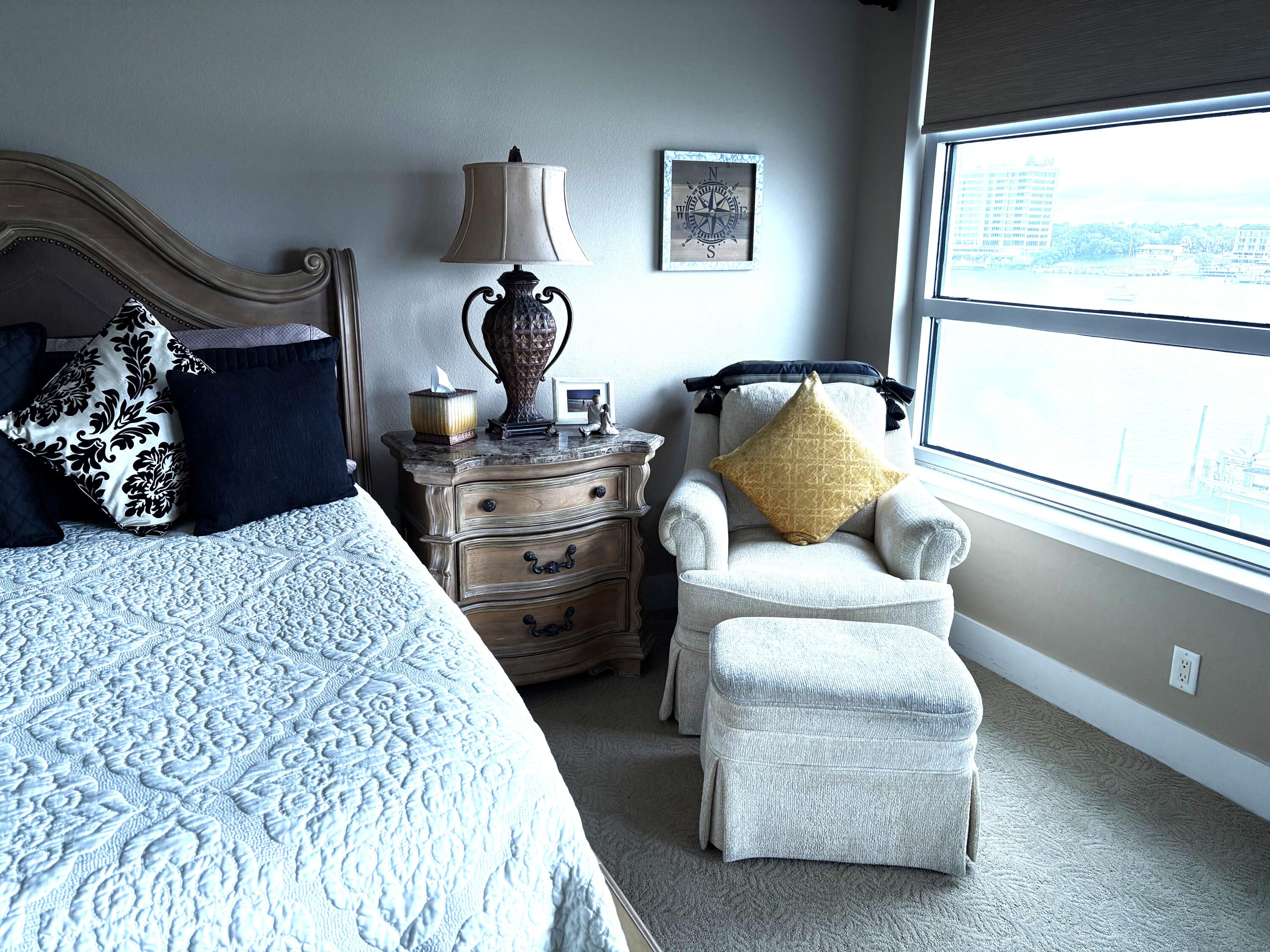 211 Durango Road, Unit 414 Destin, FL 32541 - Photo 23 of 50 a living room with furniture and a large window