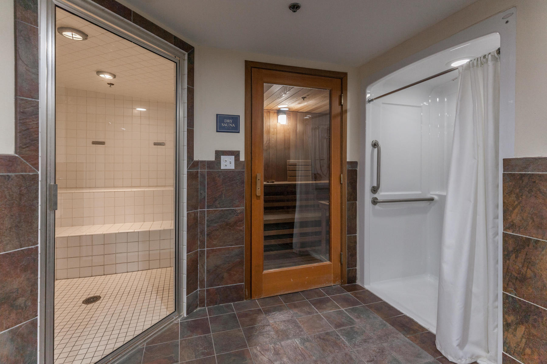 211 Durango Road, Unit 414 Destin, FL 32541 - Photo 34 of 50 a bathroom with a glass shower door