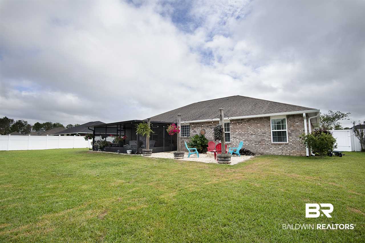 139 Meadow Run Loop West Foley, AL 36535 - Photo 9 of 43 Fenced Backyard
