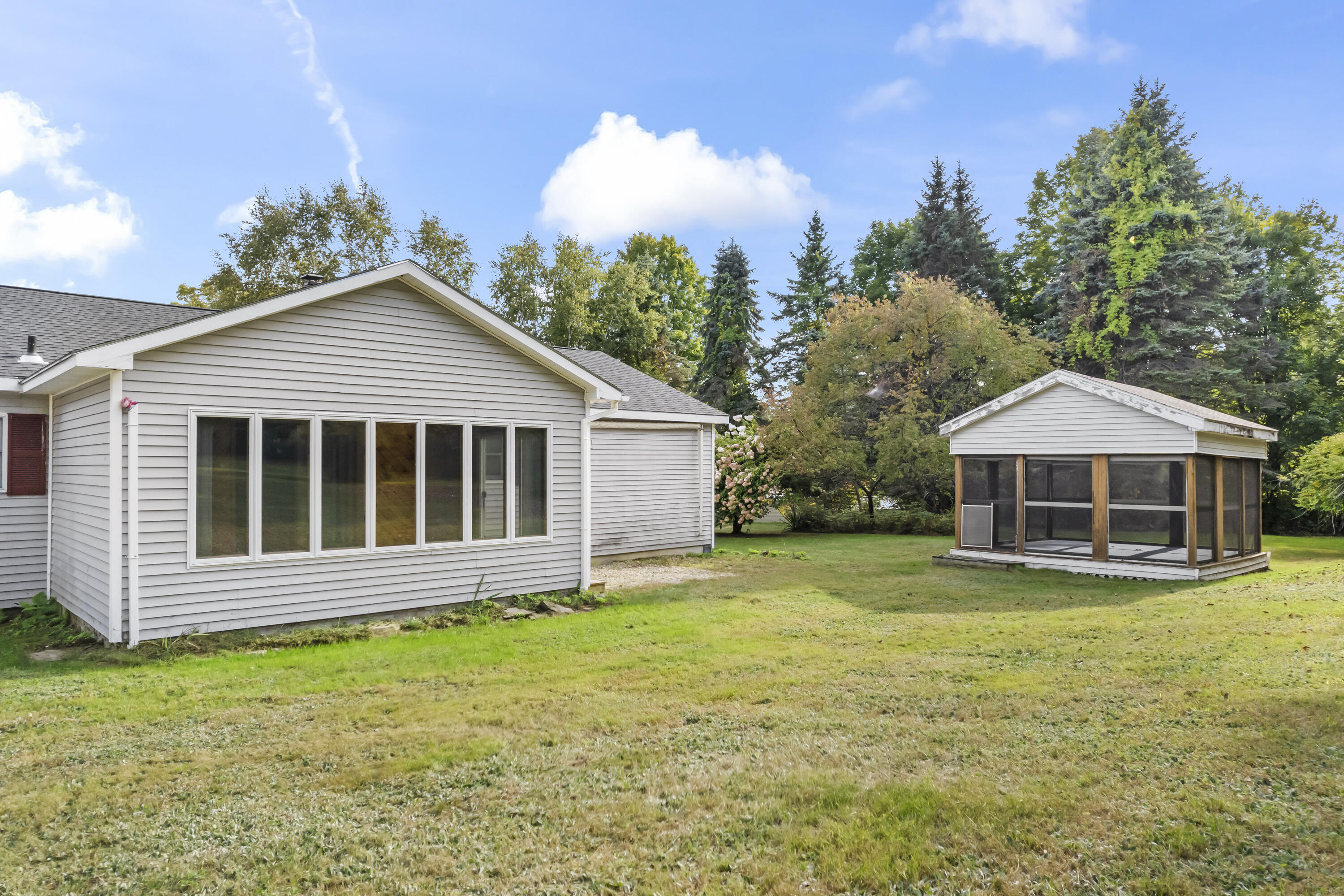 Undisclosed Address Oxford, ME 04270 - Photo 37 of 58 Back exterior and screen room