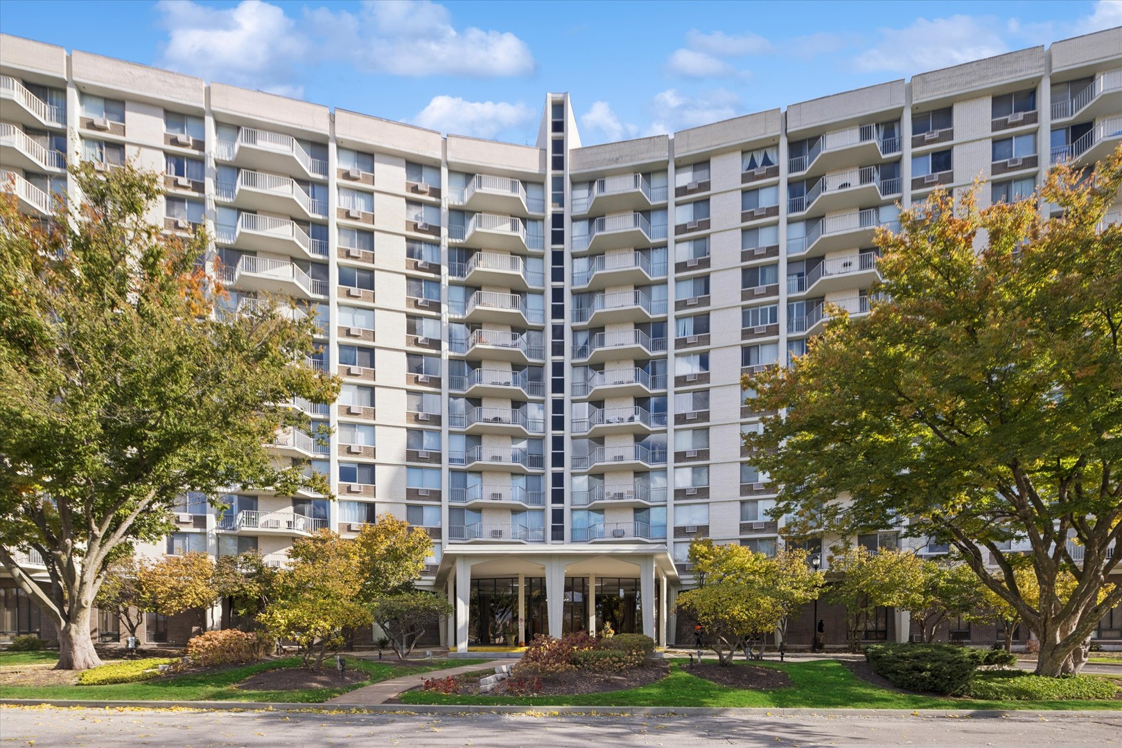 20 North Tower Road, Unit 12L Oak Brook, IL 60523 - Photo 1 of 16 a front view of a building