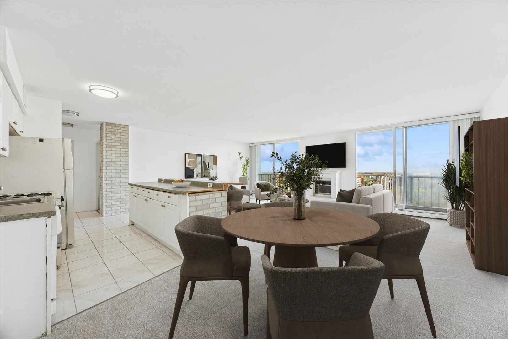 20 North Tower Road, Unit 12L Oak Brook, IL 60523 - Photo 4 of 16 a view of a dining room with furniture and a kitchen