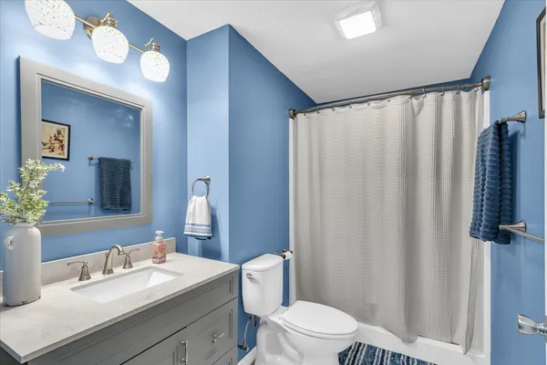 a view of a swimming pool with a lounge chairs