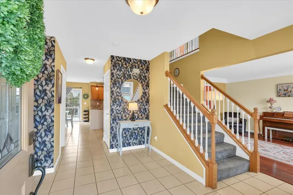 a view of entryway with stairs