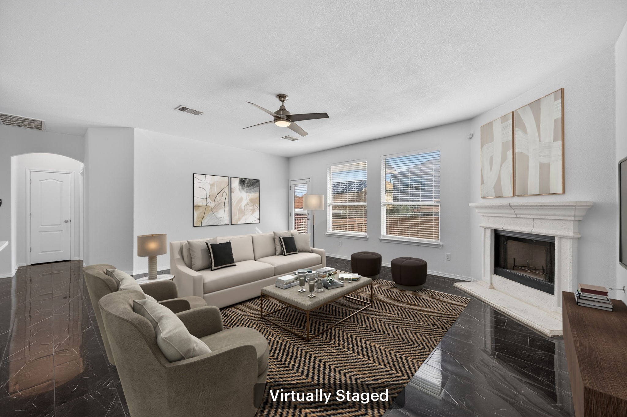 2305 Gavin Trail Pflugerville, TX 78660 - Photo 11 of 40 a living room with furniture a fireplace and a large window