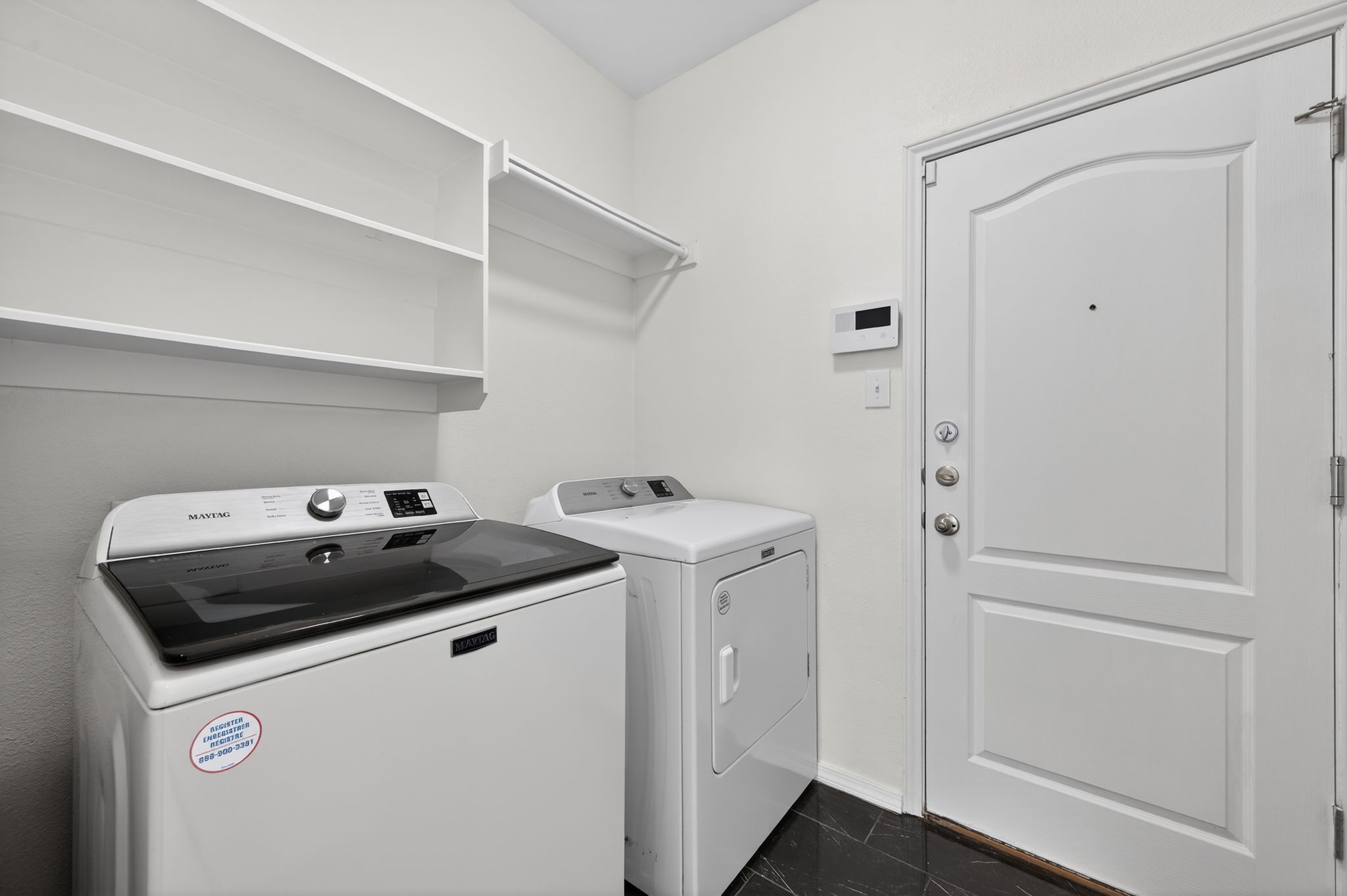 2305 Gavin Trail Pflugerville, TX 78660 - Photo 14 of 40 a utility room with dryer and washer