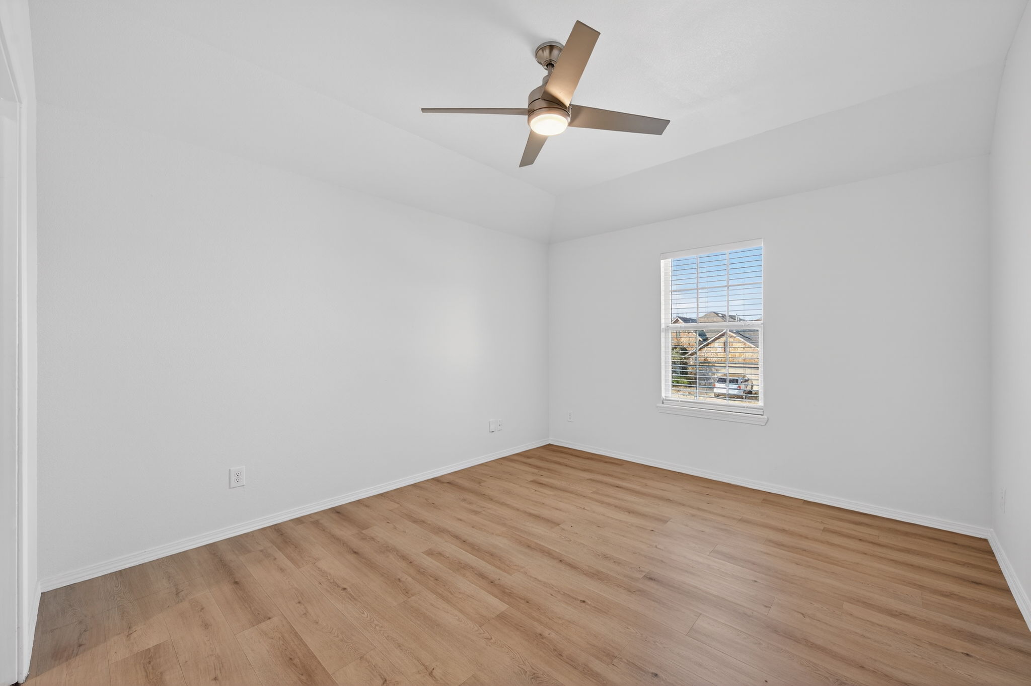 2305 Gavin Trail Pflugerville, TX 78660 - Photo 29 of 40 a view of empty room with wooden floor