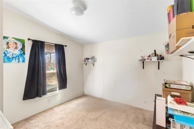 a view of an entryway with front door