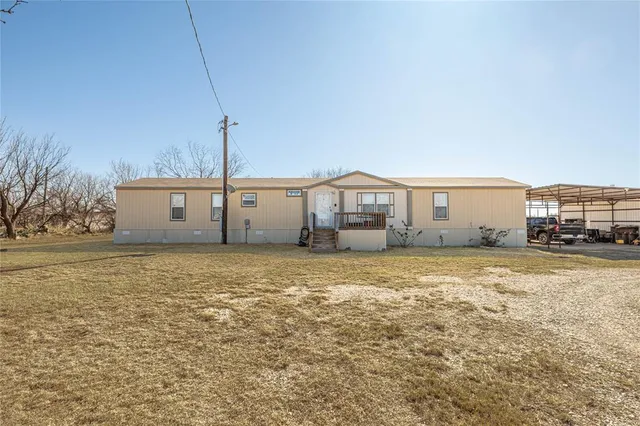 a house view with a outdoor space