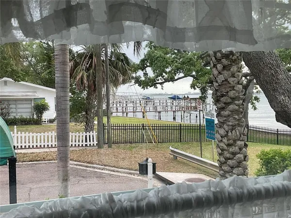 a view of outdoor space with garden and patio