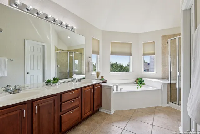 a bath tub sitting next to a window