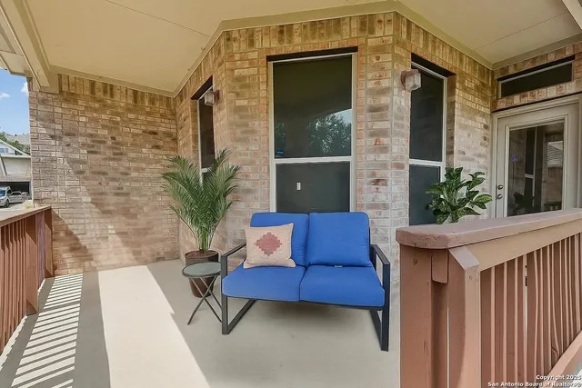 a view of a swimming pool with a terrace