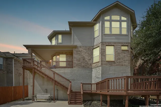 a picture of a room that has a window and white walls