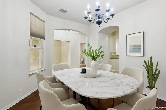 a living room with a couch and a flat screen tv