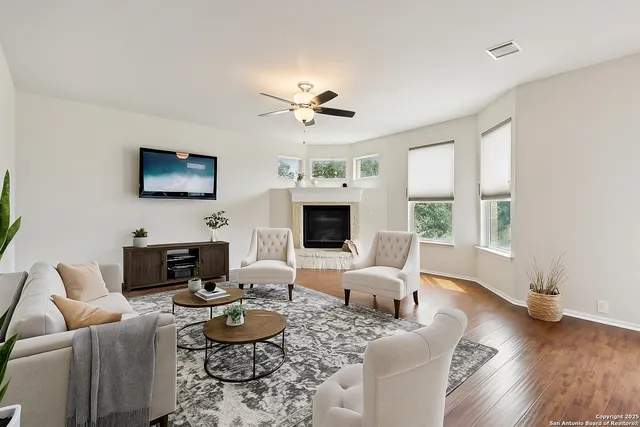 a kitchen with stainless steel appliances granite countertop a stove refrigerator sink microwave and cabinets