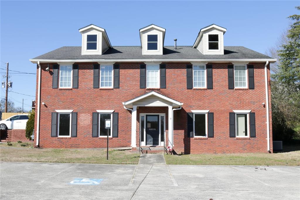6519 Spring Street Douglasville, GA 30134 - Photo 1 of 1 front view of a brick house