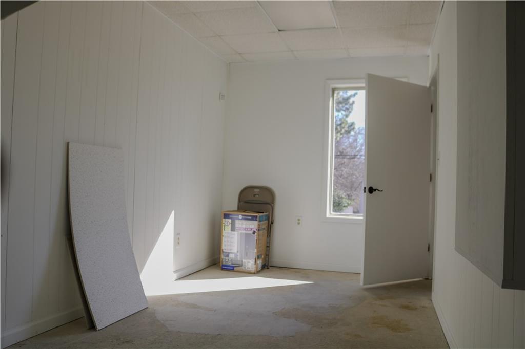 6519 Spring Street Douglasville, GA 30134 - Photo 14 of 17 a view of empty room with windows