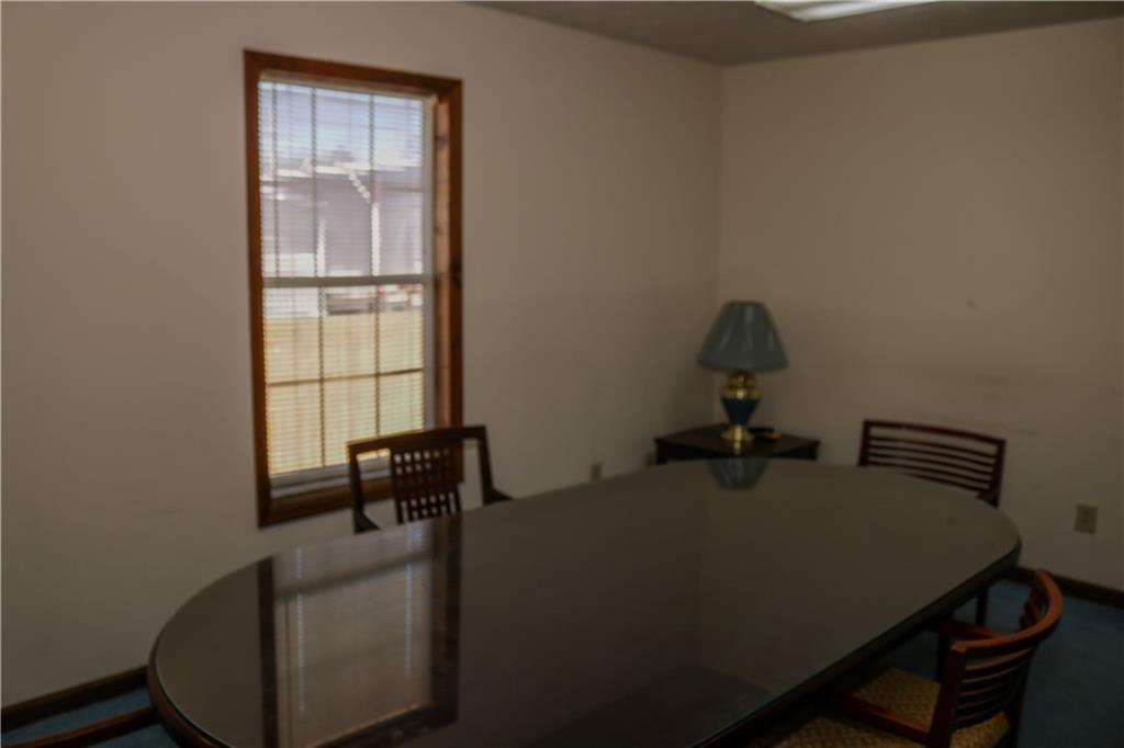 6519 Spring Street Douglasville, GA 30134 - Photo 15 of 17 a room with a desk and chair