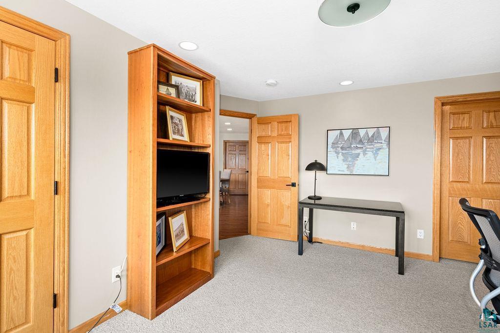 4856 Kingston Street Duluth, MN 55804 - Photo 45 of 88 Room featuring light beige walls, recessed lighting, and light oak wood doors and trim