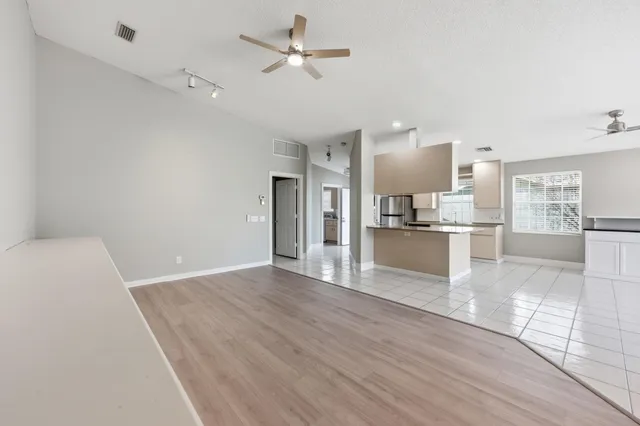 a view of kitchen with wooden floor