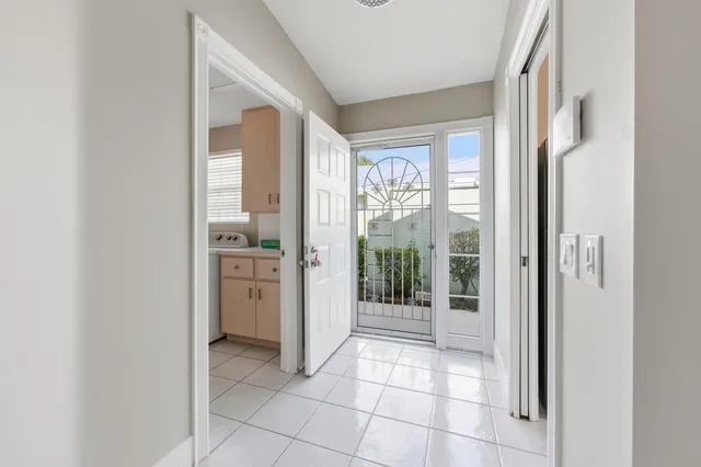 a view of a kitchen with a window