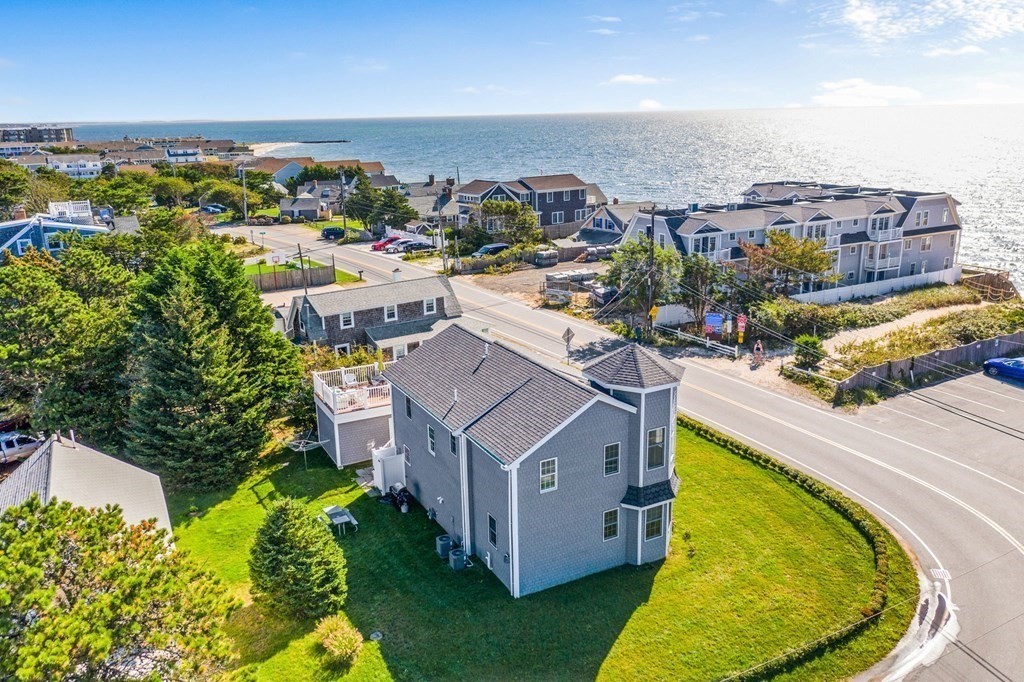 2 Chase Avenue Dennis, MA 02639 - Photo 1 of 24 an aerial view of a house with a swimming pool