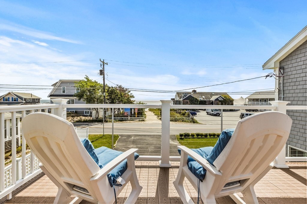 2 Chase Avenue Dennis, MA 02639 - Photo 2 of 24 a view of a swimming pool with a lounge chair