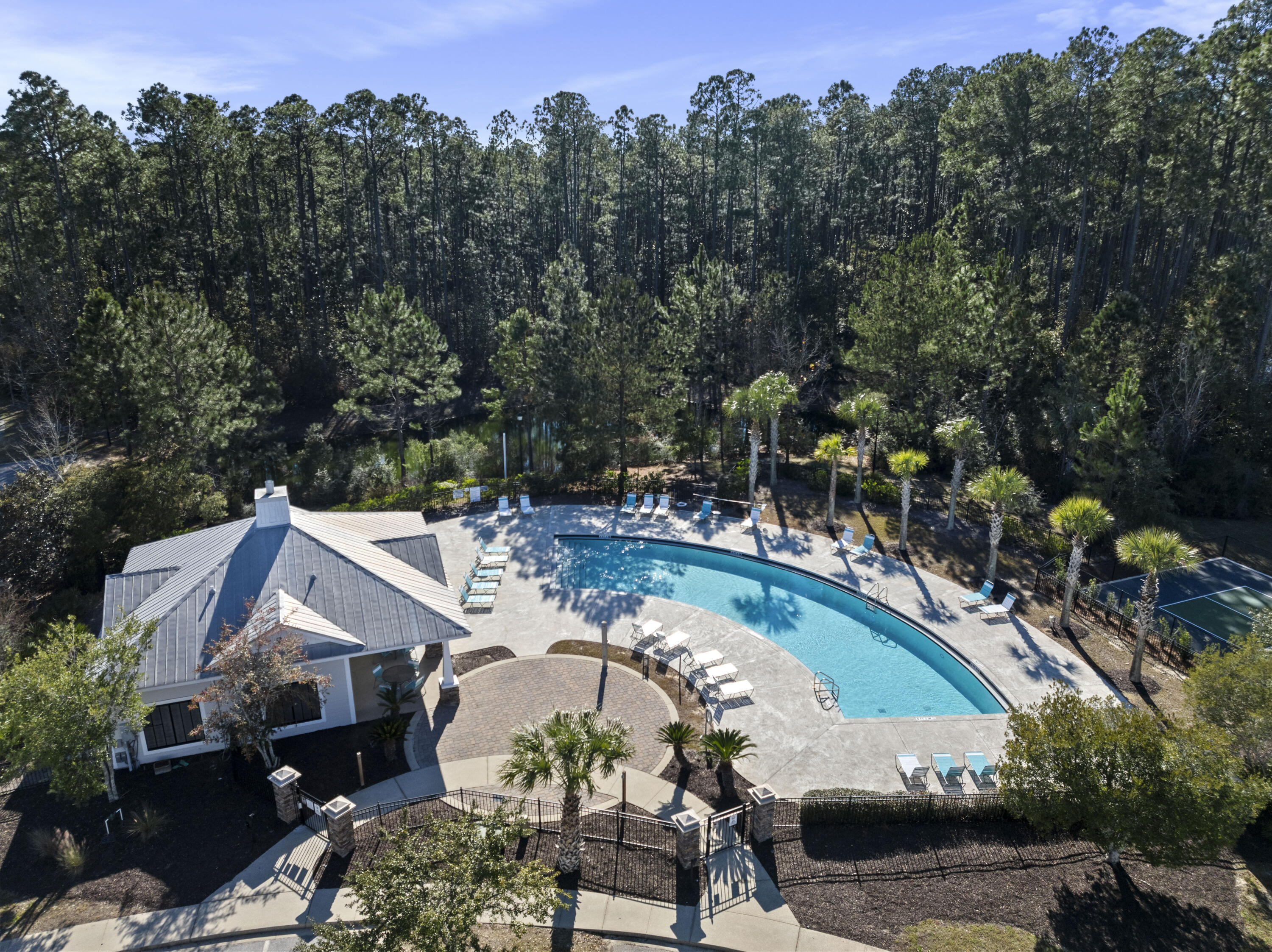 16 Date Palm Lane Freeport, FL 32439 - Photo 21 of 35 an aerial view of a house with swimming pool patio and lake view