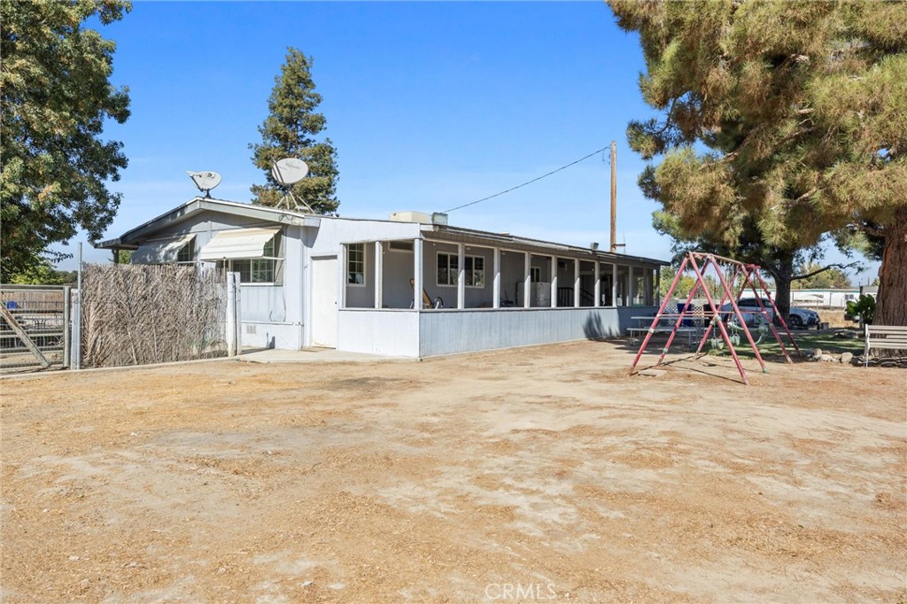 4730 Coronado Street West Bakersfield, CA 93314 - Photo 20 of 29 a front view of a house with a yard