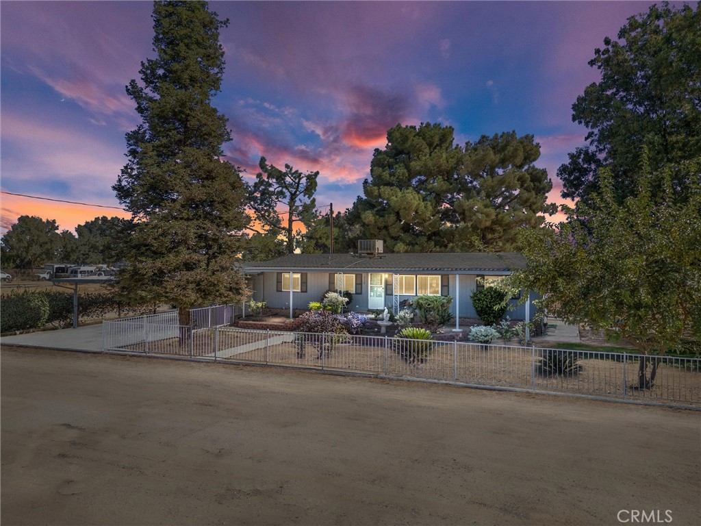 4730 Coronado Street West Bakersfield, CA 93314 - Photo 2 of 29 a view of a roadside with trees