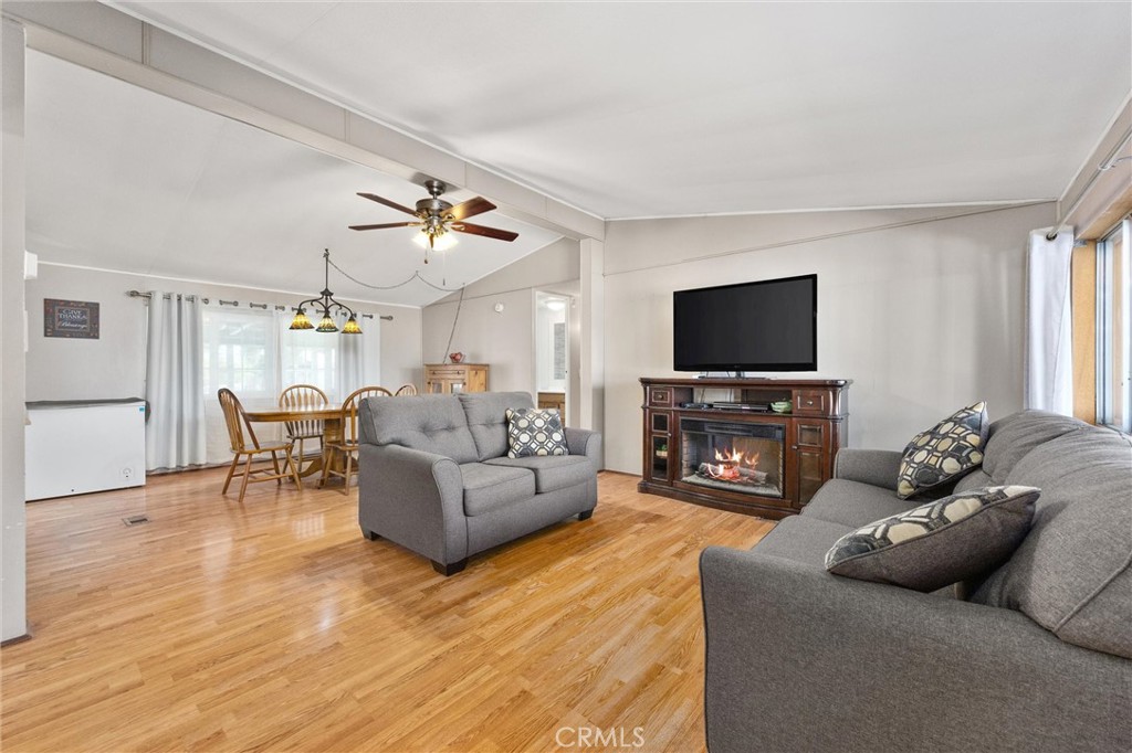 4730 Coronado Street West Bakersfield, CA 93314 - Photo 5 of 29 a living room with furniture and a flat screen tv