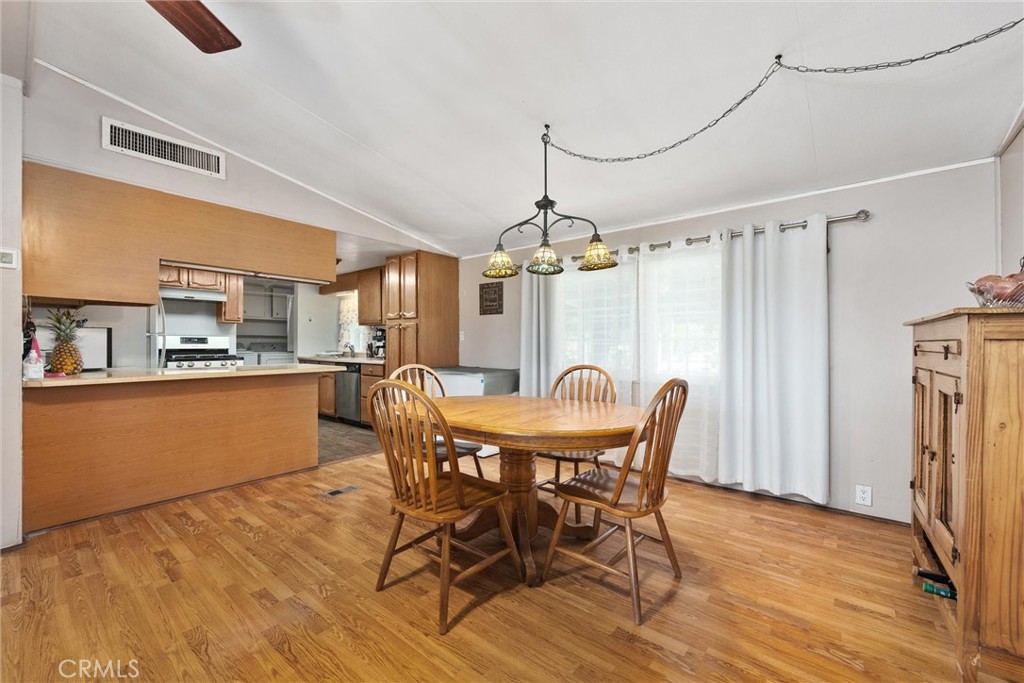 4730 Coronado Street West Bakersfield, CA 93314 - Photo 8 of 29 a view of a dining room with furniture and window